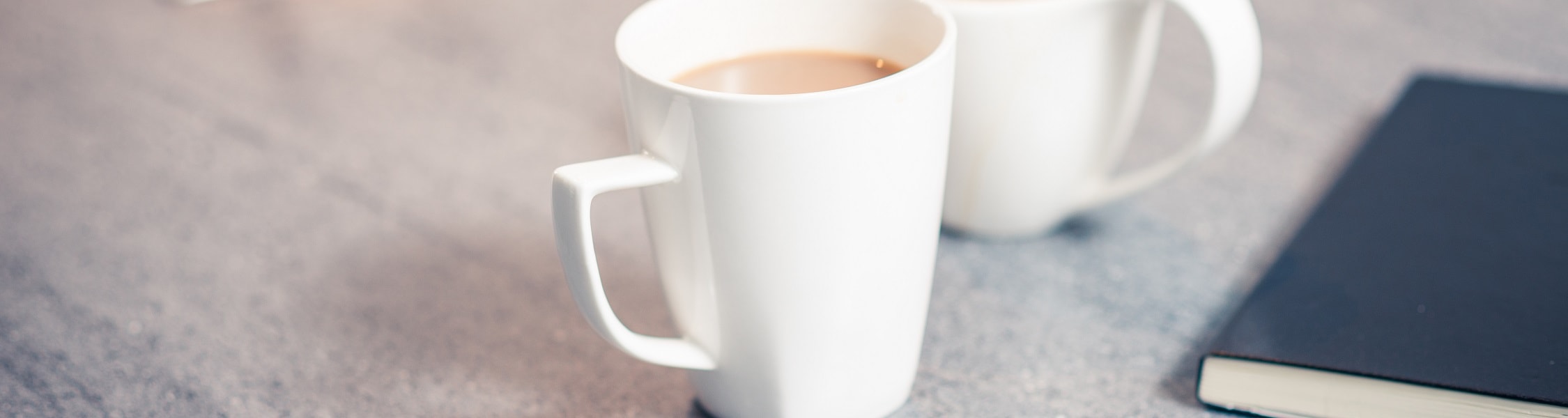 white mugs filled with tea