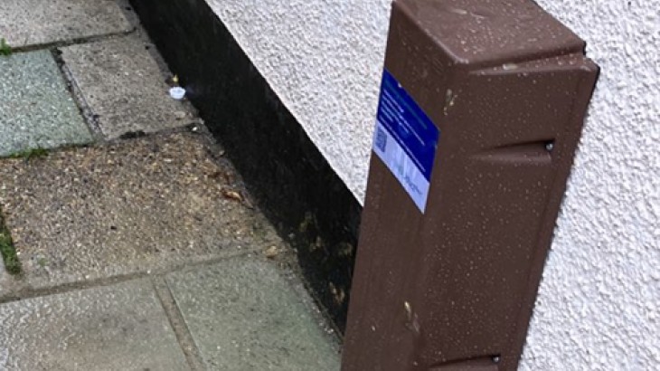 Wall mounted pipe entry