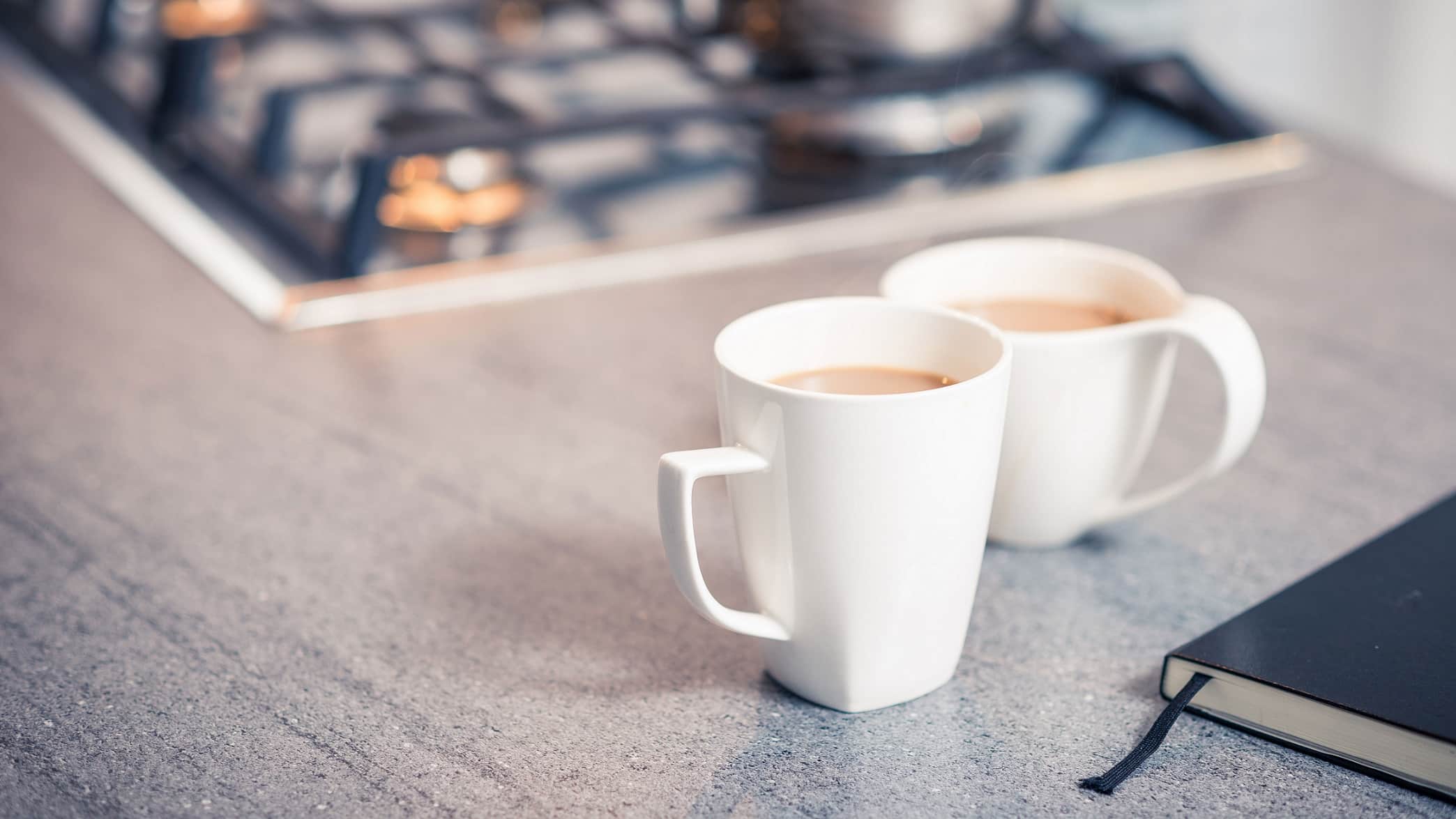 mugs of tea on kitchen worktop