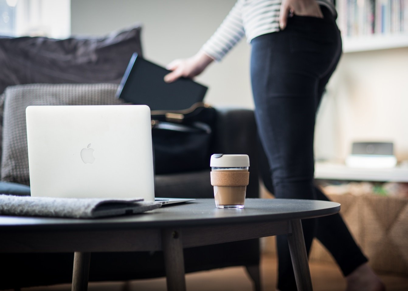 laptop and coffee cup on table