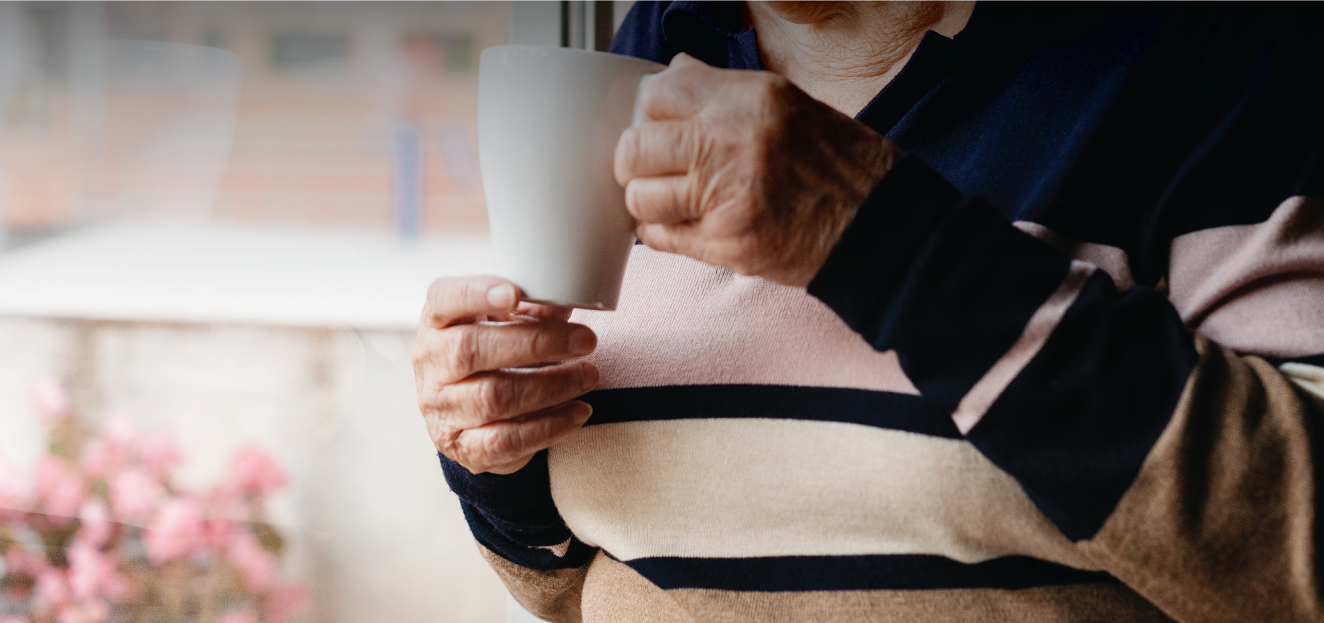 woman holding a cup of tea