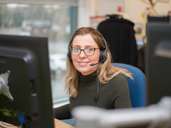 employee on phone with headset